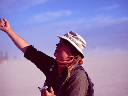 J.C. flying a kite out in the deep playa